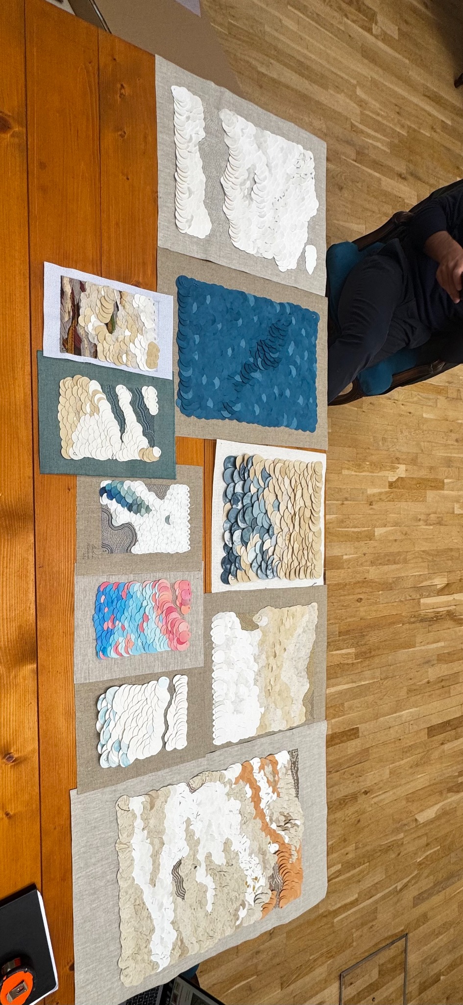 Caroline Karenine works arranged on a studio table